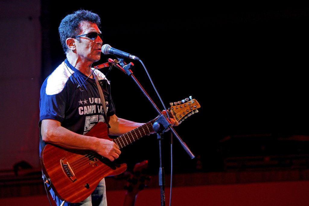 XVI Mediterranean Games - Edoardo Bennato Performs At Casa Italia