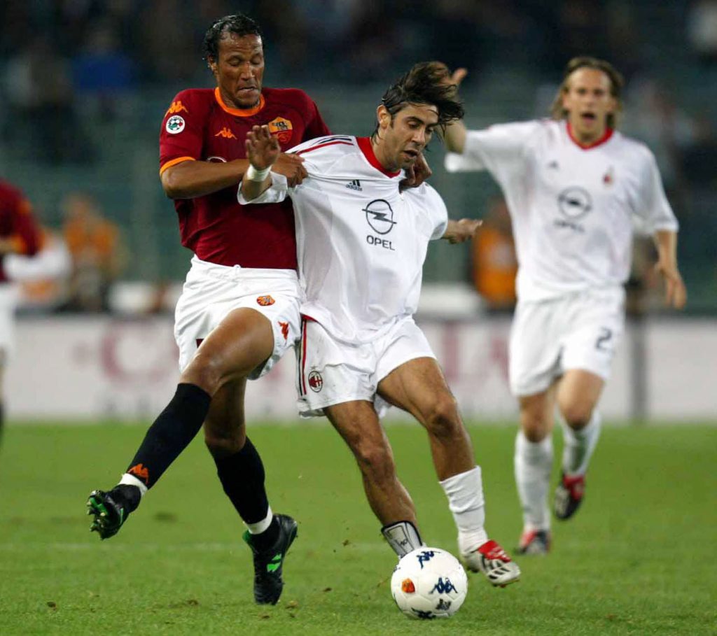 Jonathan Zebina of Roma and Manuel Rui Costa of AC Milan in action
