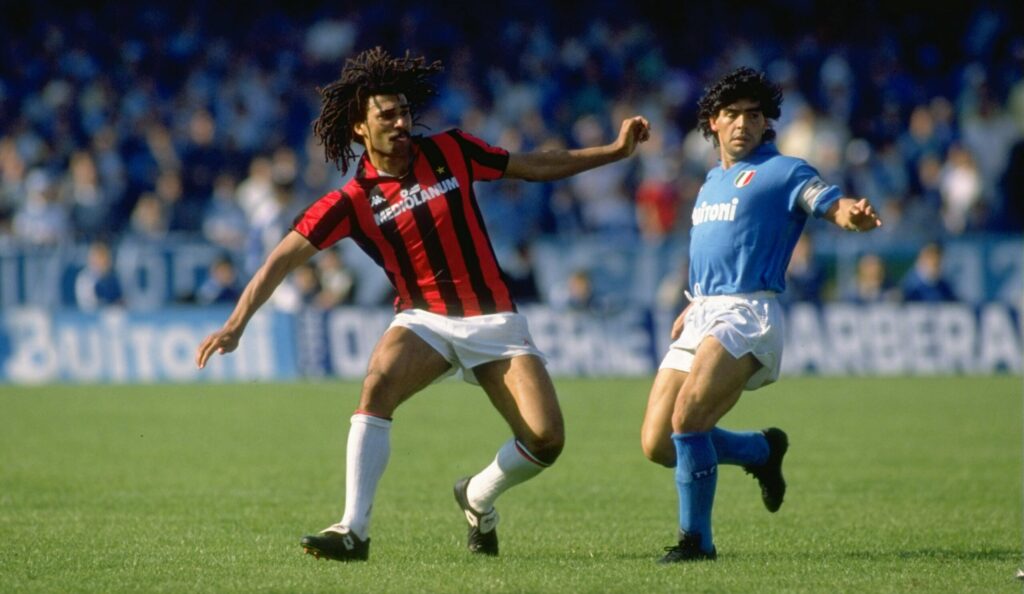 Ruud Gullit of AC Milan and Diego Maradona of Napoli wait for the ball to be passed